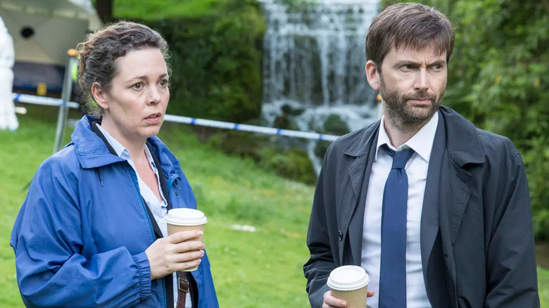 Olivia Coleman and David Tennant as Ellie Miller and Alec Hardy drinking coffee outdoors in Broadchurch