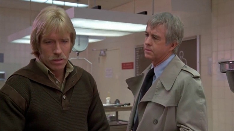 Chuck Norris as Logan and Clu Gulager as Dunne in A Force of One