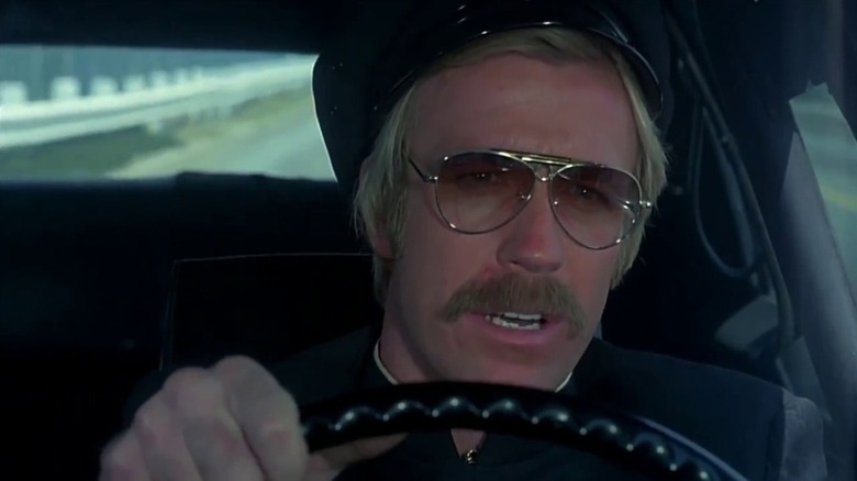 Chuck Norris as Booker driving in Good Guys Wear Black