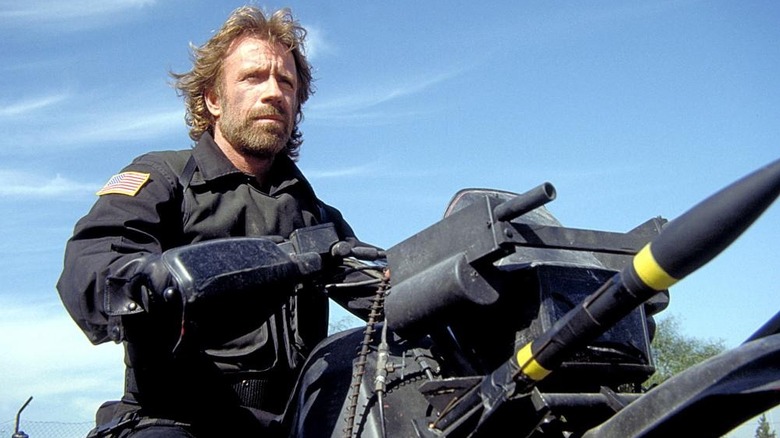 Chuck Norris as Scott McCoy looking intense in The Delta Force