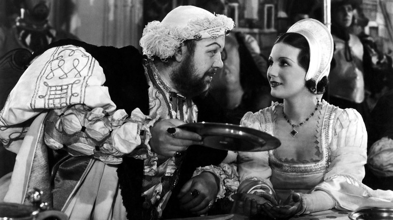 Charles Laughton and Merle Oberon in "The Private Life of Henry III"