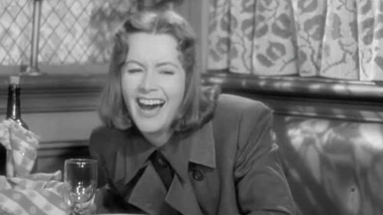 Greta Garbo laughing