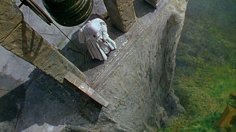 Nun ringing cliffside bell Black Narcissus