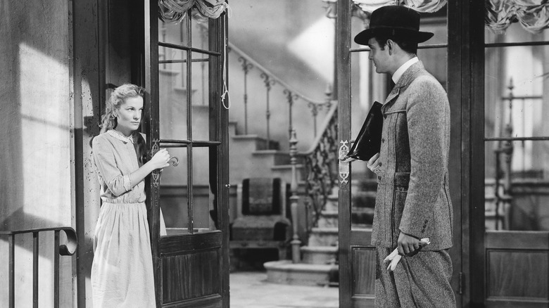 Joan Fontaine staring shyly at Louis Jourdan Letter from an Unknown Woman