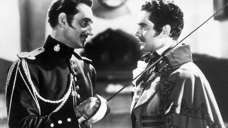 Basil Rathbone threatening Tyrone Power The Mark of Zorro