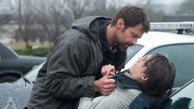 Hugh Jackman grabs Paul Dano