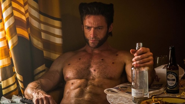 Wolverine drinking alone