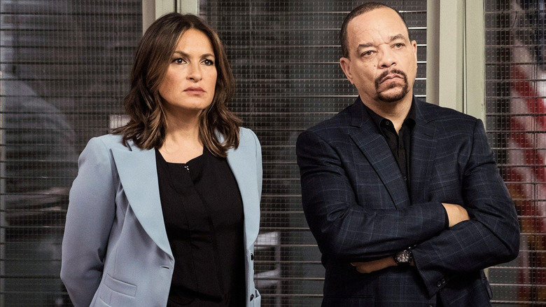 Oliva Benson and Odafin Tutuola standing in the precinct in Law & Order: SVU