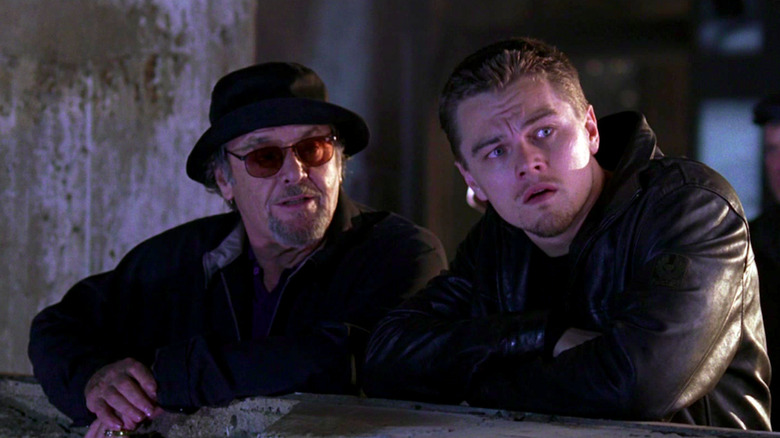 Frank Costello (Jack Nicholson) speaks to Billy Costigan (Leonardo DiCaprio) in a construction site at night in The Departed