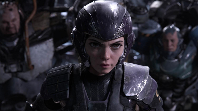 Alita is wearing a chrome body an helmet, ready for battle in Alita: Battle Angel