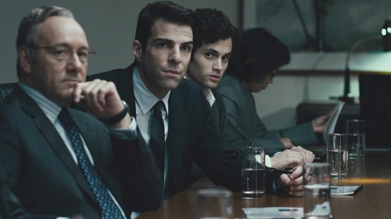 Sam Rogers, Peter Sullivan, and Seth Bregman at a conference table in Margin Call (2011)