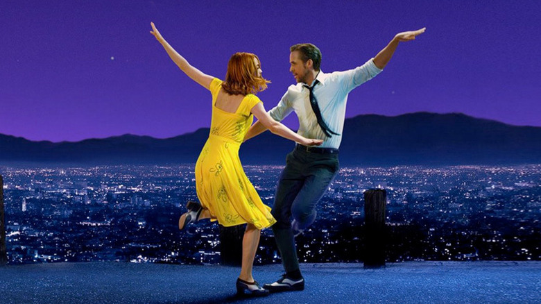 Ryan Gosling as Seb dances with Emma Stone as Mia in La La Land