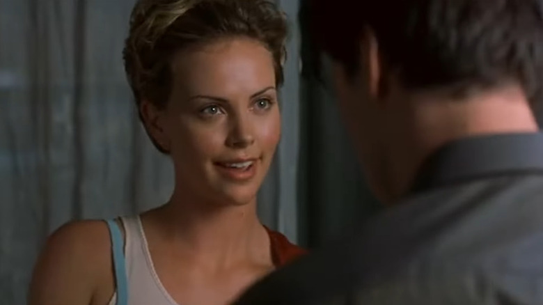 Charlize Theron as Sara Deever smiles in Sweet November