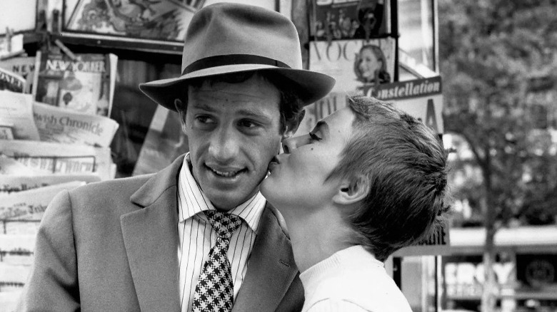 Jean Seberg kisses Jean-Paul Belmondo