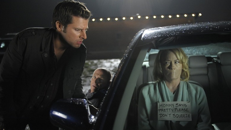 James Roday Rodriguez, Corbin Bernsen, and Cybill Shepherd as Shawn, Henry, and Madeleine Spencer, with Madeleine trapped in a car, on Psych