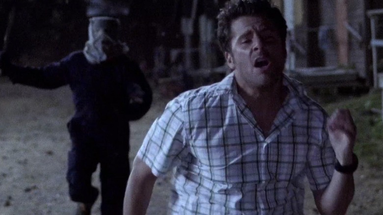 James Roday Rodriguez as Shawn running from a masked killer on Psych