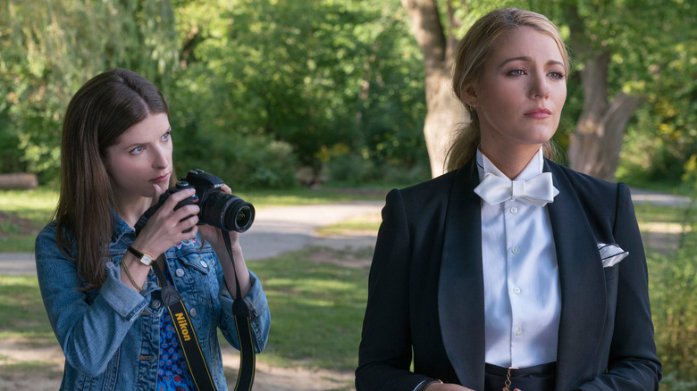 Anna Kendrick and Blake Lively as Stephanie and Emily, with the former photographing the latter in A Simple Favor