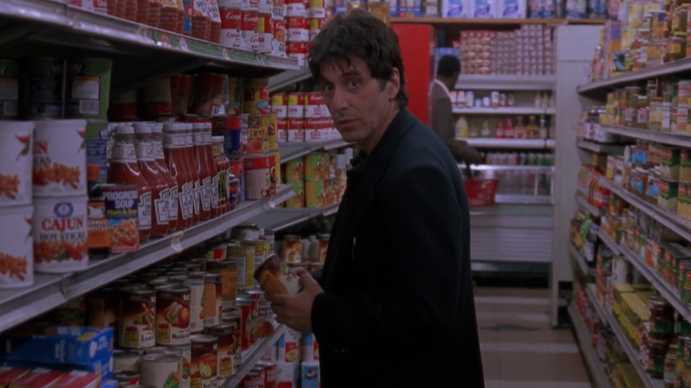 Al Pacino as Frank Keller, looking at something in the grocery store in Sea of Love