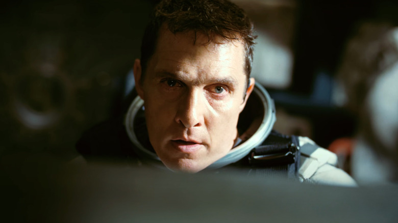 Matthew McConaughey as Cooper flies a spaceship in Interstellar