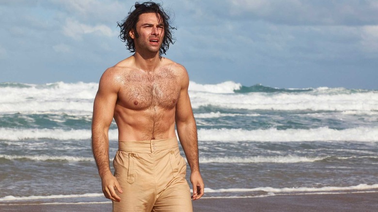 Ross Poldark (Aidan Turner) stands shirtless on the beach on Poldark