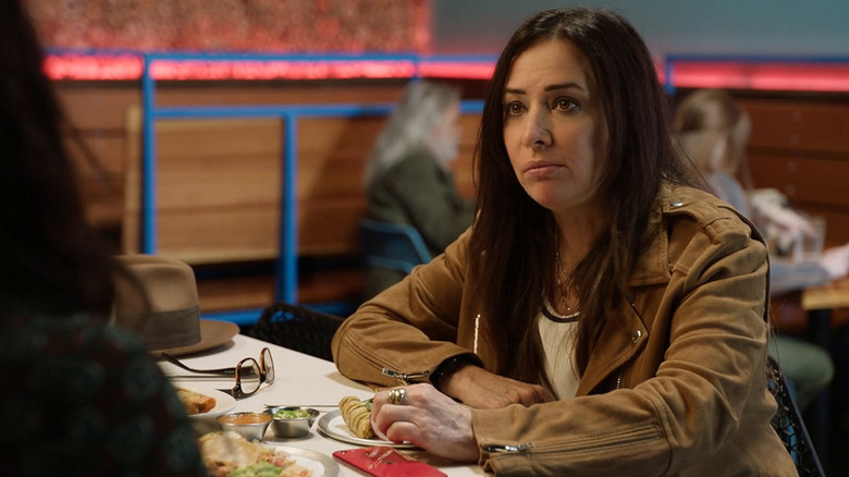 Sam Fox (Pamela Adlon) sits at restaurant in Better Things