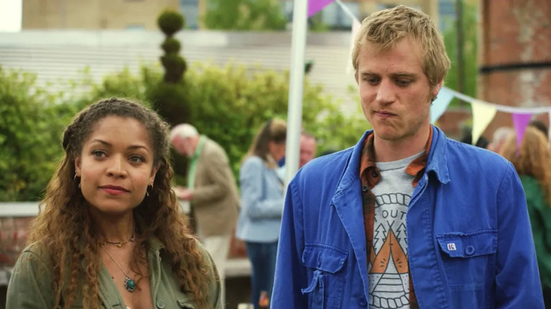 Dylan (Johnny Flynn) and Evie (Antonia Thomas) at a party on Lovesick