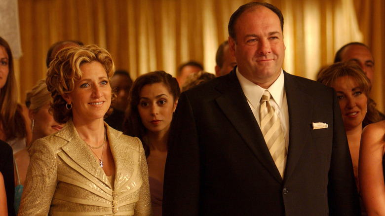 James Gandolfini as Tony Soprano and Edie Falco as Carmela smiling in The Sopranos