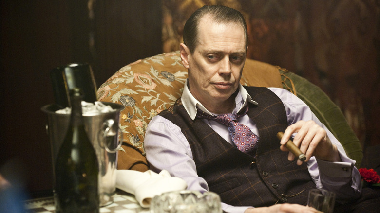 Nucky (Steve Buscemi) smoking cigar in Boardwalk Empire