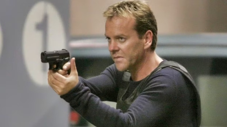 Jack Bauer (Kiefer Sutherland) aims a pistol on 24