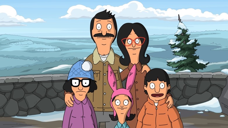 The Belcher family hold each other by a snowy landscape in Bob's Burgers