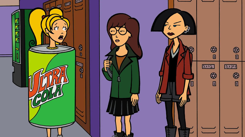 Brittany (Lisa Kathleen Collins) wears a soda mascot costume while speaking with Daria (Tracy Grandstaff) and Jane (Wendy Hoopes) on Daria