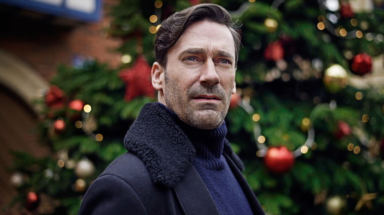 Jon Hamm as Matt Trent, wandering in front of a Christmas tree in the Black Mirror episode White Christmas