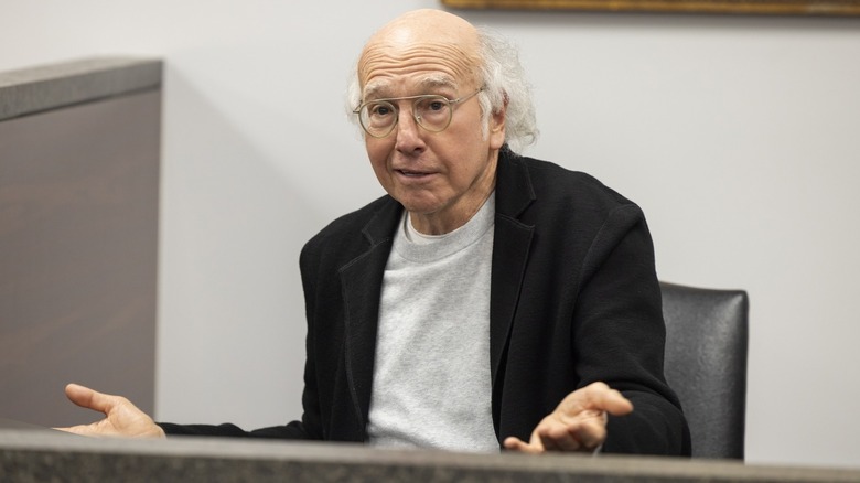 Larry David as Larry David sitting on the stand and explaining in Curb Your Enthusiasm