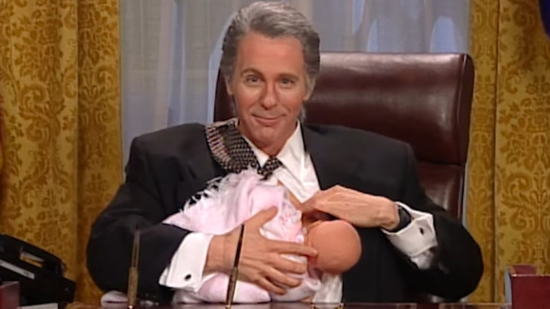 Bill Clinton with a baby on The Dana Carvey Show