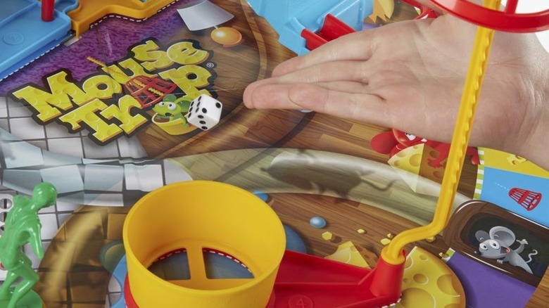 rolling dice for Mouse Trap board