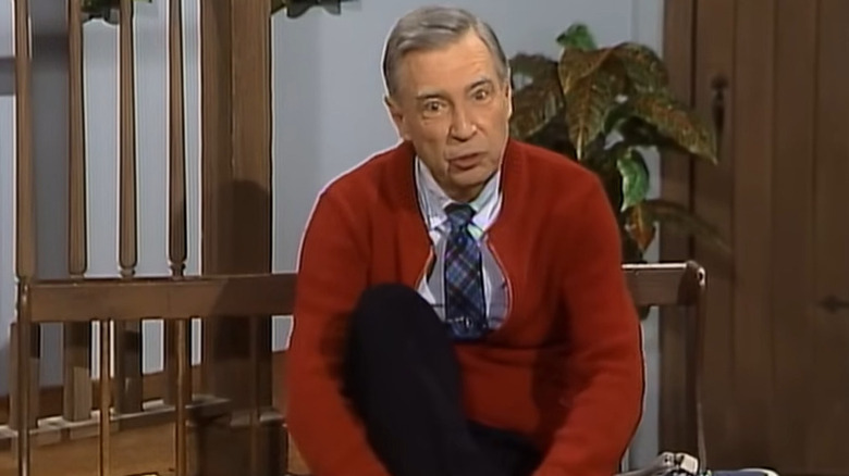 Mr. Rogers tying his shoes on Mister Rogers' Neighborhood