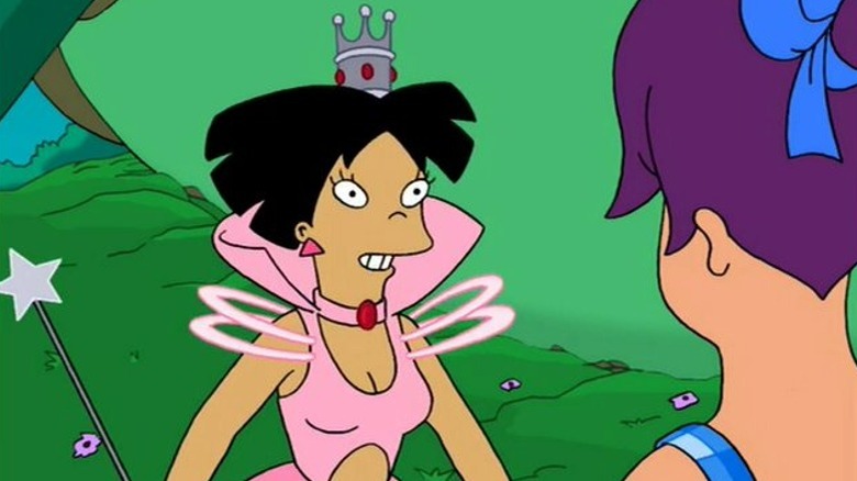 Amy as a witch talking to Leela as Dorothy