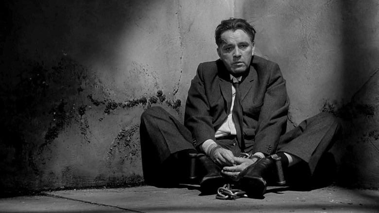 Richard Burton chained in a cell