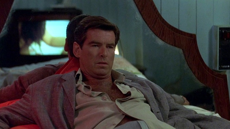 Pierce Brosnan, depressed, in bed