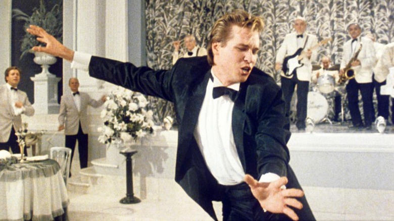 Val Kilmer shaking it like Elvis.