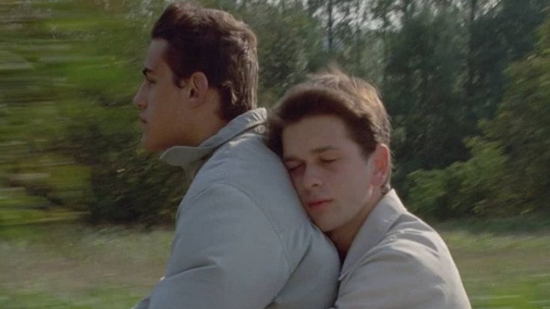 François and Serge riding a bike through the country