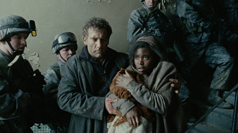 children of men Clive Owen protects a kid