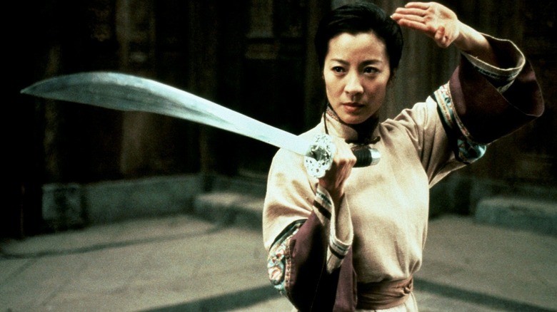 Michelle Yeoh holding sword