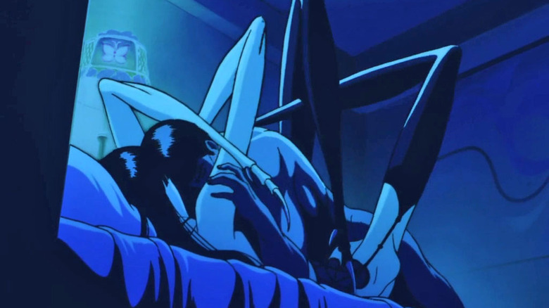 A man is being intimate with a spiderwoman in Wicked City