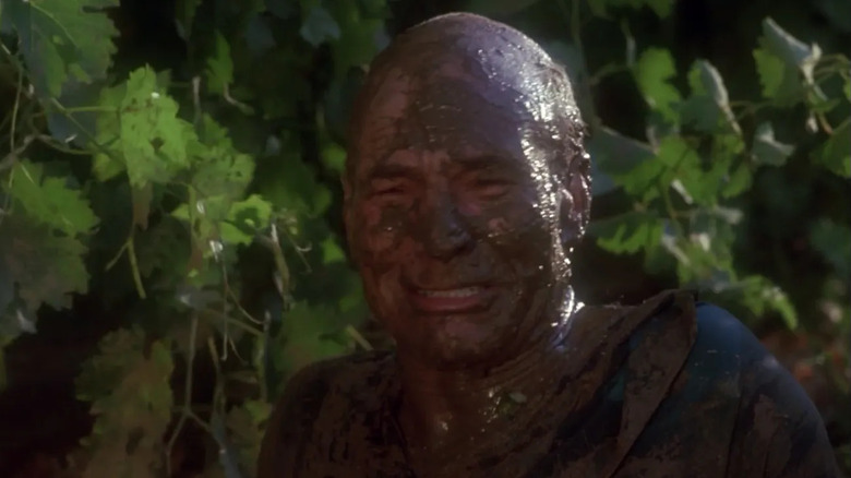 Picard (Patrick Stewart) cries while covered in mud in Star Trek: The Next Generation