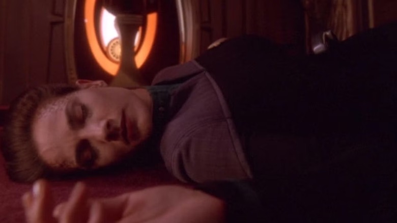 Jadzia Dax (Terry Farrell) lays mortally wounded in Star Trek: Deep Space Nine