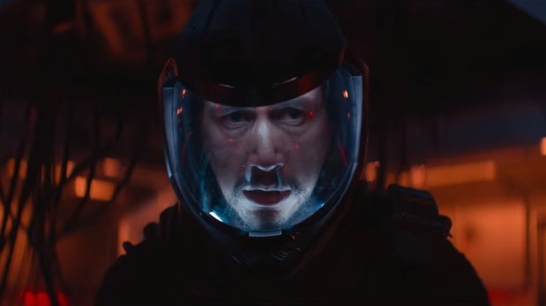 Adam Driver in astronaut helmet in 65