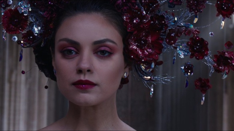 Mila Kunis red and white floral headpiece in Jupiter Ascending