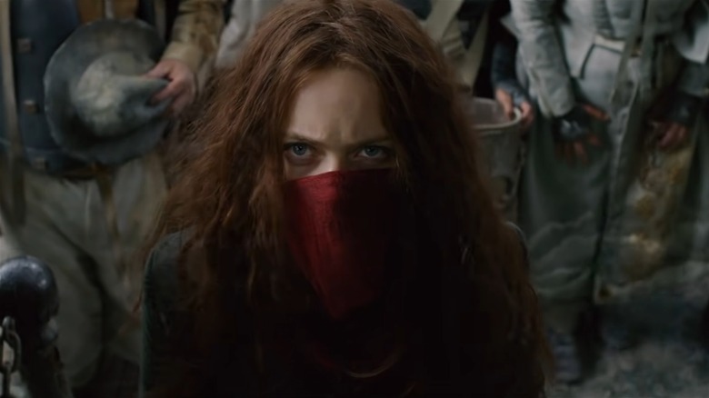 Hester Shaw, red scarf over her nose in Mortal Engines