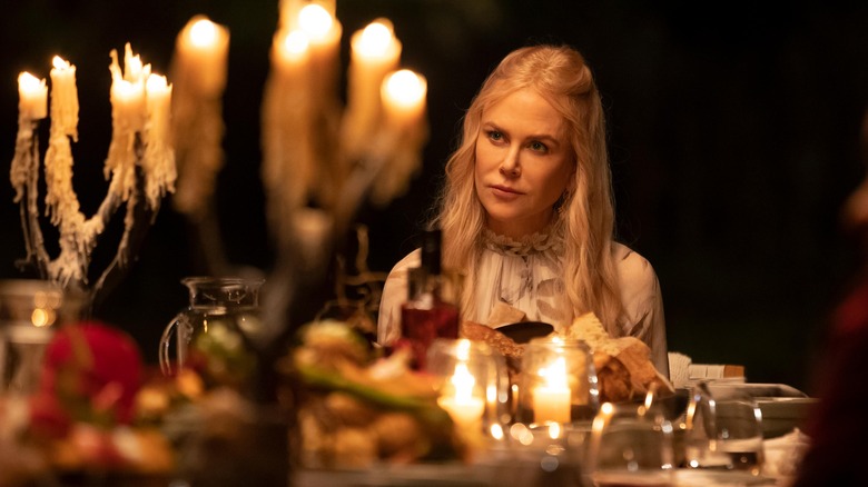 Nicole Kidman is lit by candle light